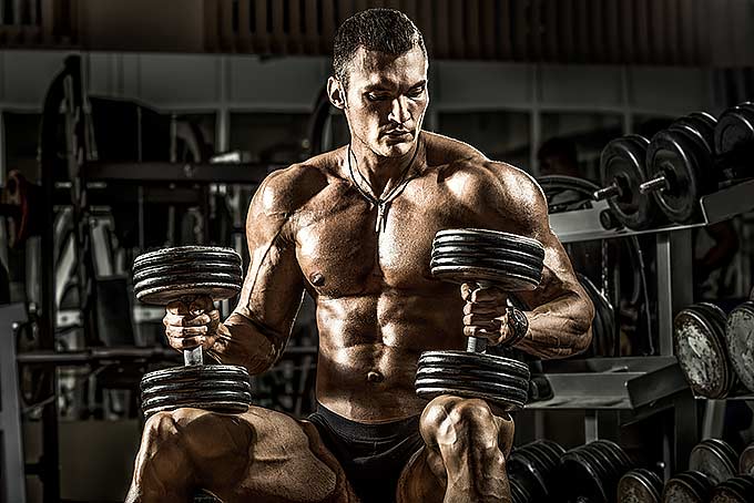A bodybuilder which is lifting heavy weights